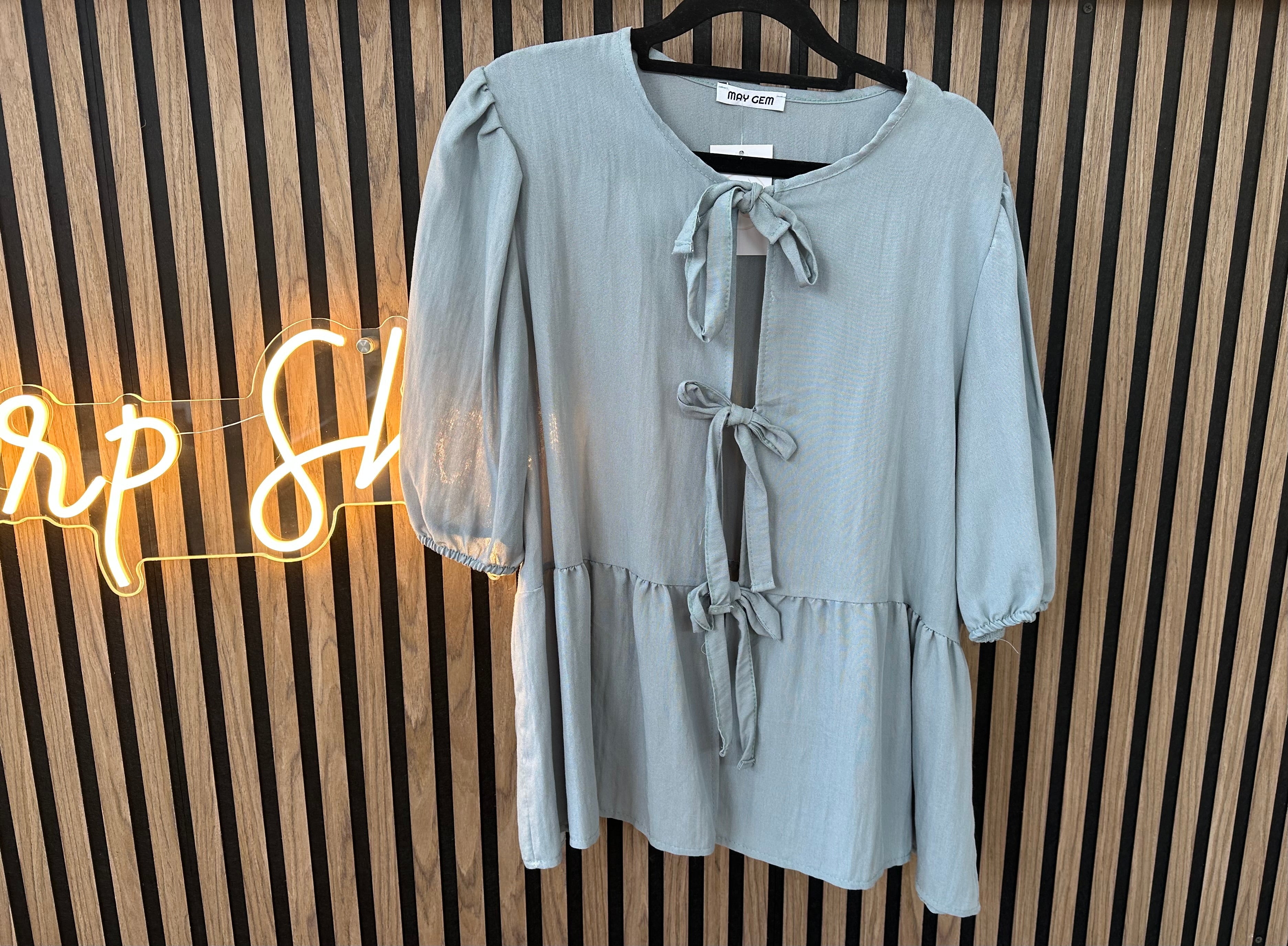 Tunikabluse mit Schleifen